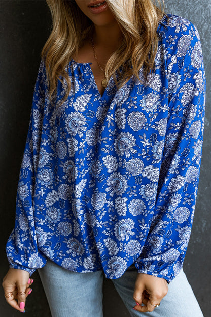 Blusa de manga larga con cuello en V y muesca floral azul 
