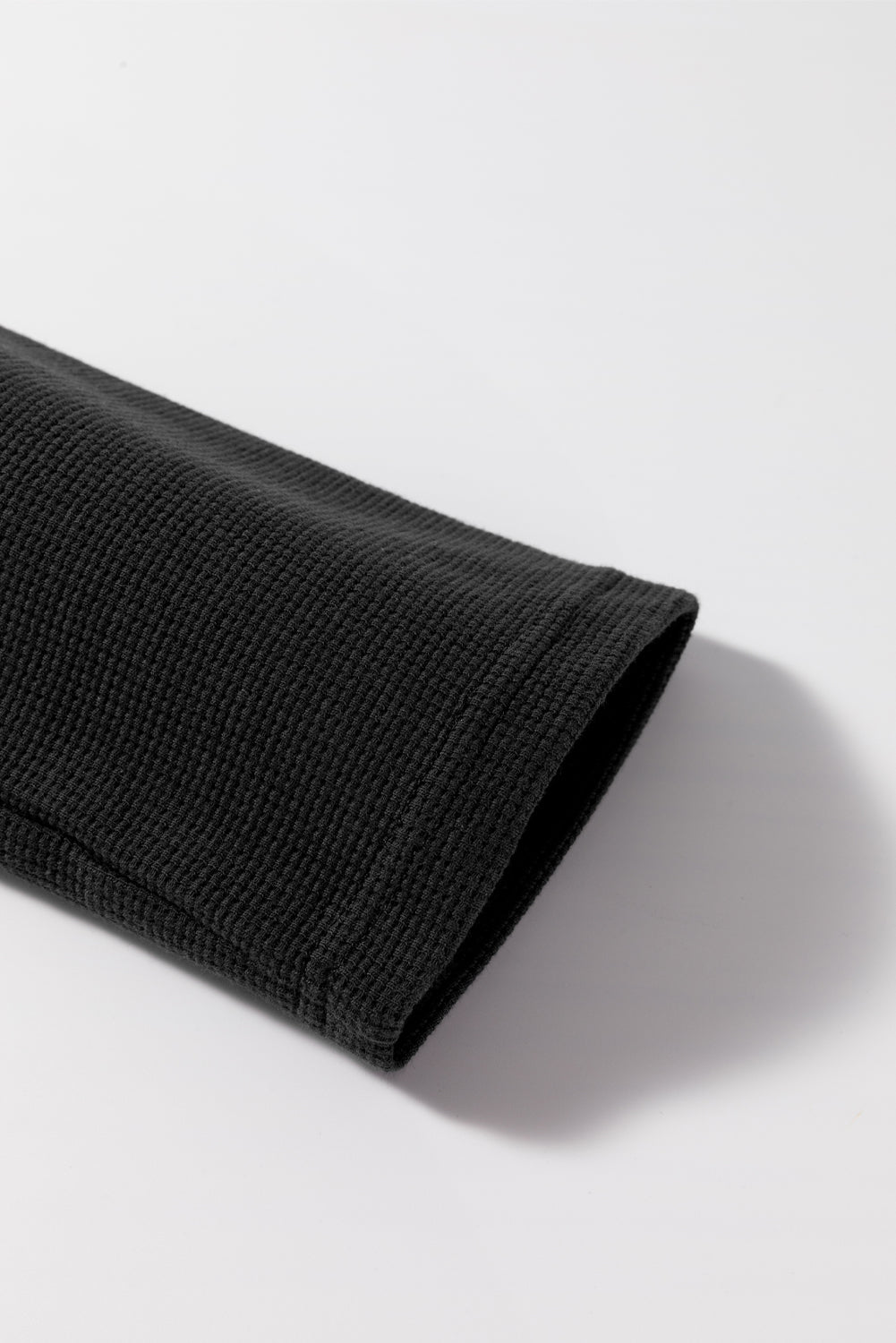 Haut raglan en tricot gaufré à blocs de couleurs et motif étoile