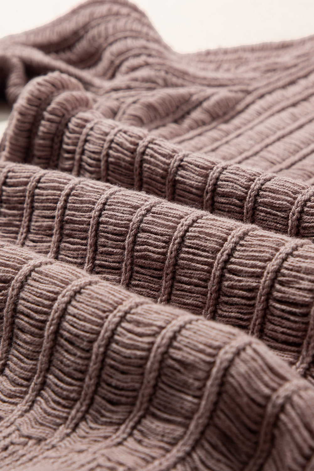 Cardigan boutonné en tricot texturé découpé en chèvre