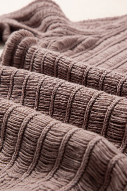 Cardigan boutonné en tricot texturé découpé en chèvre