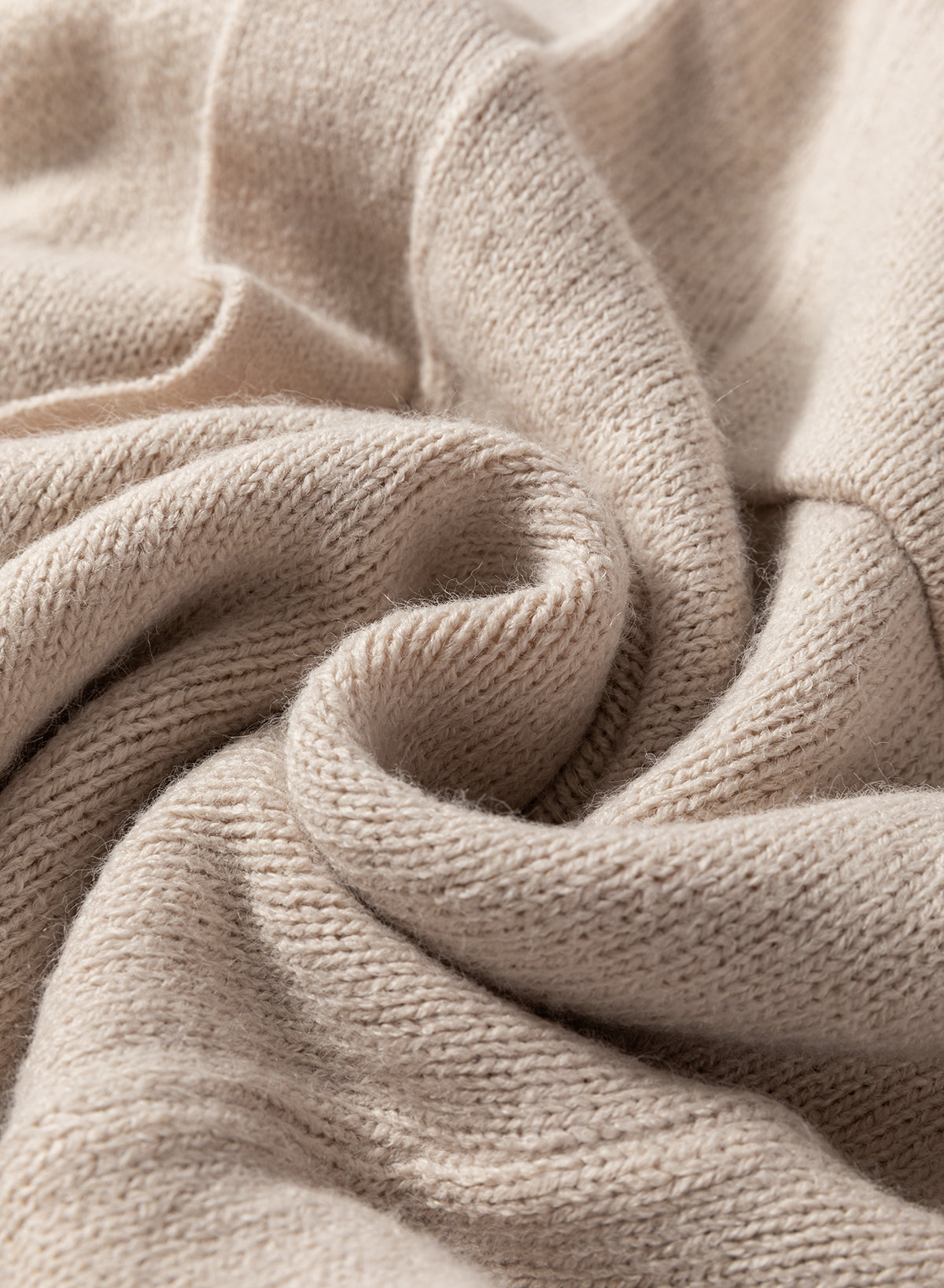 Cardigan long en maille beige ouvert sur le devant avec poches latérales