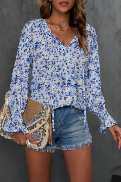 Blusa con botones y cuello en V con estampado floral 