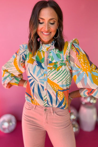 Chemise beige à col montant et manches lanternes à volants et smocks abstraits