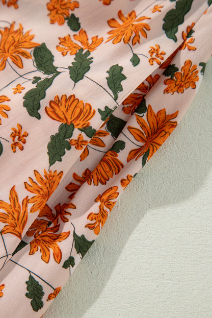 Robe babydoll beige à fleurs, décolleté en V profond, buste froncé, manches bouffantes