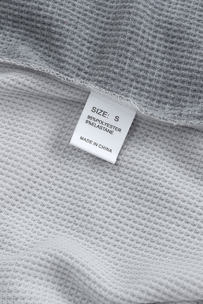 Haut en tricot gaufré à manches contrastées et imprimé léopard sauvage