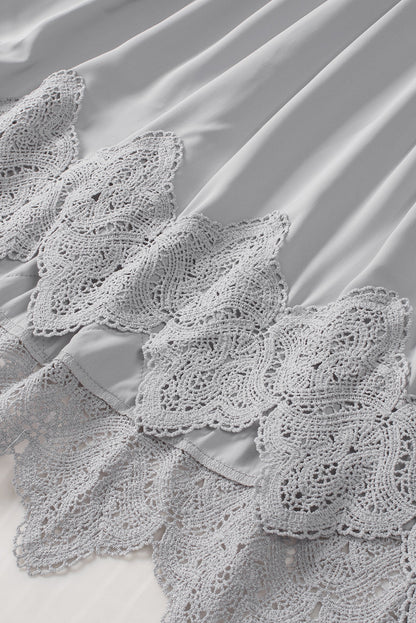 Chemisier à manches cloche et empiècements en crochet