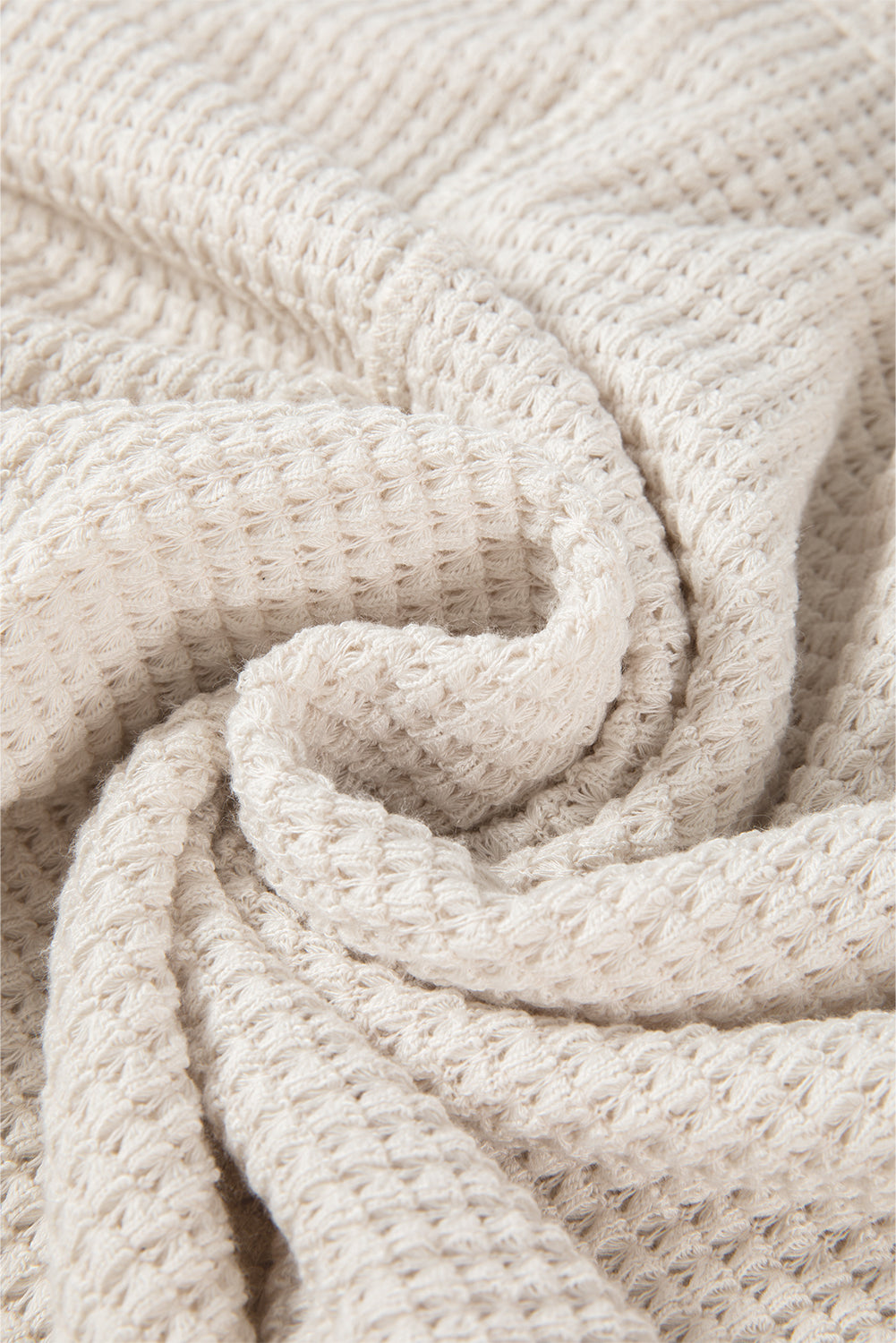 Haut oversize en tricot gaufré abricot à manches chauve-souris fendues