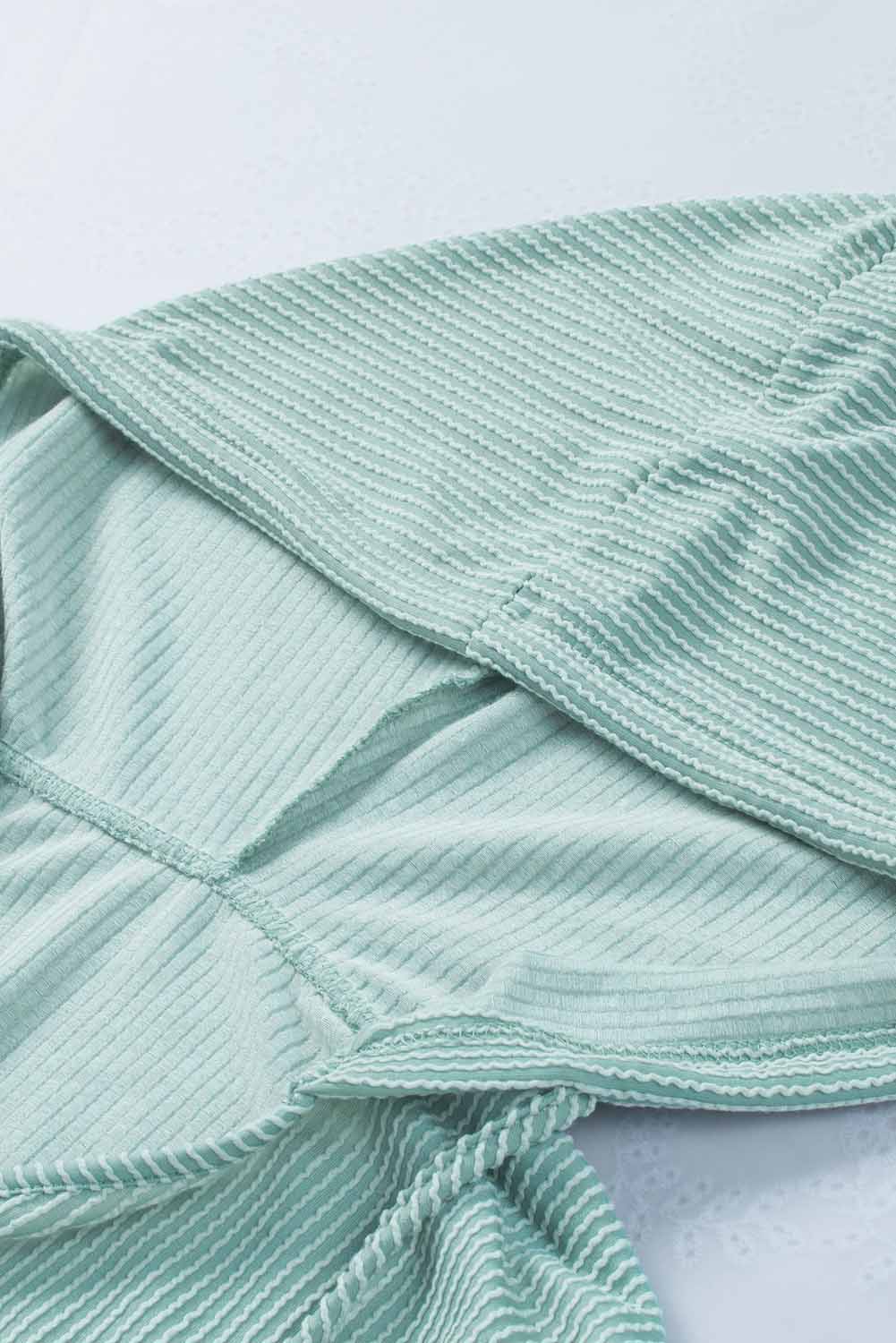 Sudadera con capucha holgada y cuello en V de canalé