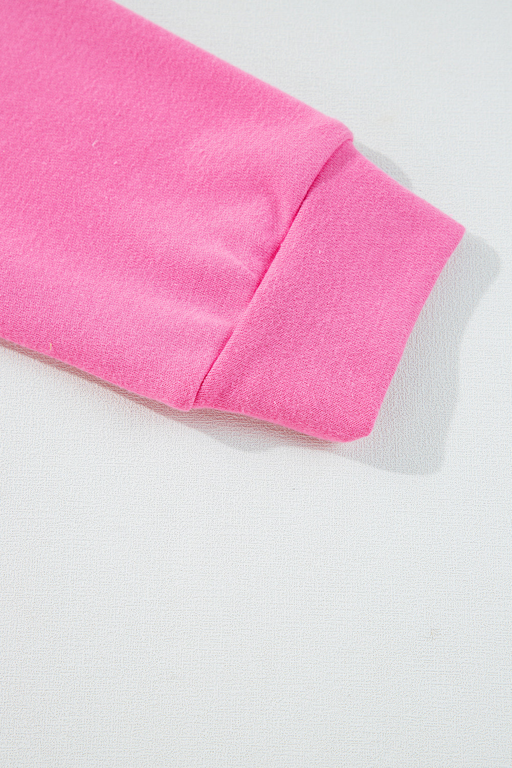 Ensemble haut à manches longues et short rose à imprimé patchwork