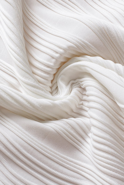 Haut blanc uni texturé à manches courtes et col en V