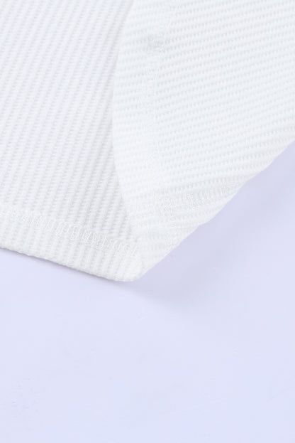 Top henley de punto gofre con medio botón 