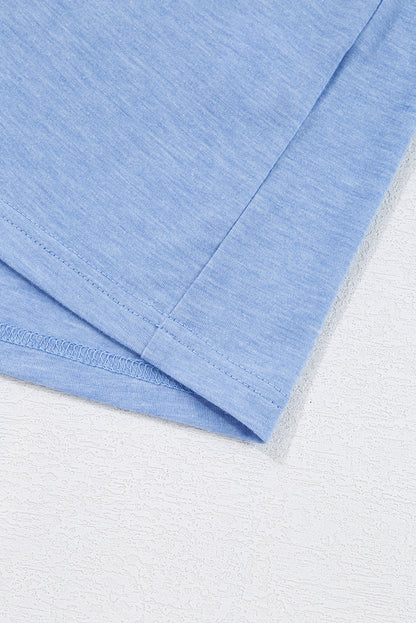 T-shirt grande taille bleu ciel à imprimé léopard et patch colorblock