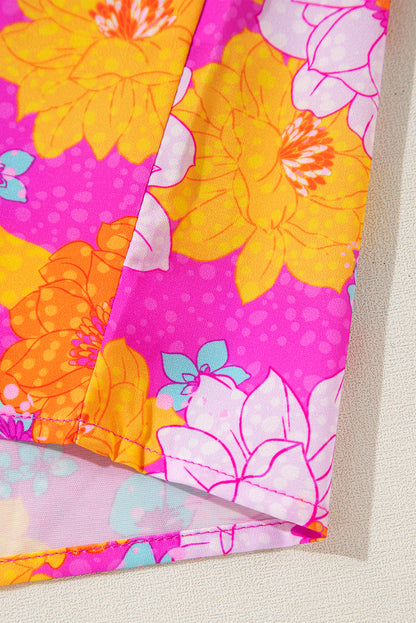 Chemisier à imprimé floral rose, manches volantées et col cranté