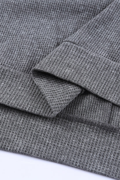 Top tipo jersey con abertura lateral y punto tipo gofre 