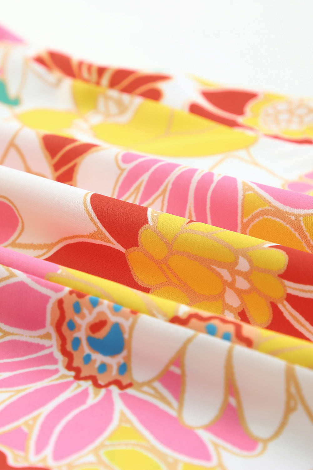 Top floral con mangas acampanadas y cuello levantado multicolor