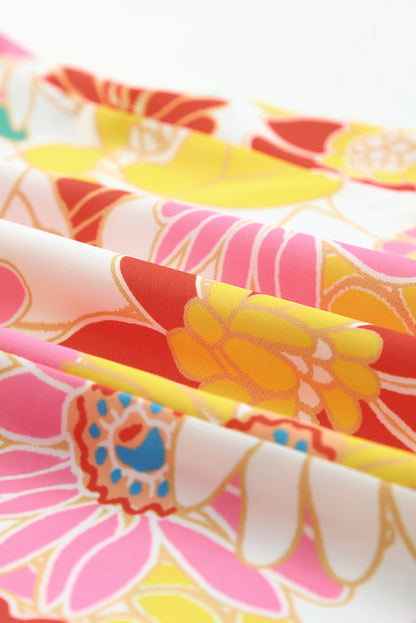 Top floral con mangas acampanadas y cuello levantado multicolor