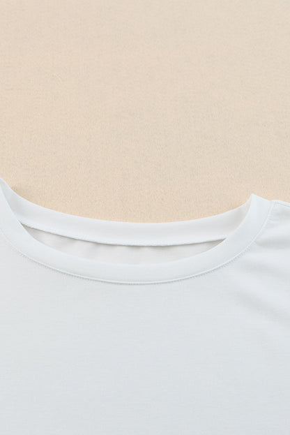 Chemisier à col rond et manches bouffantes 