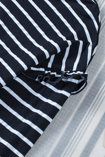 Haut à manches longues boutonné à volants et imprimé rayé