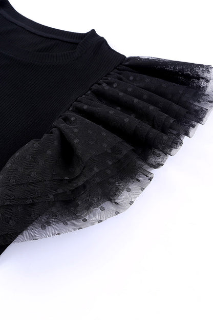 Haut en maille côtelée à volants et manches en maille à pois