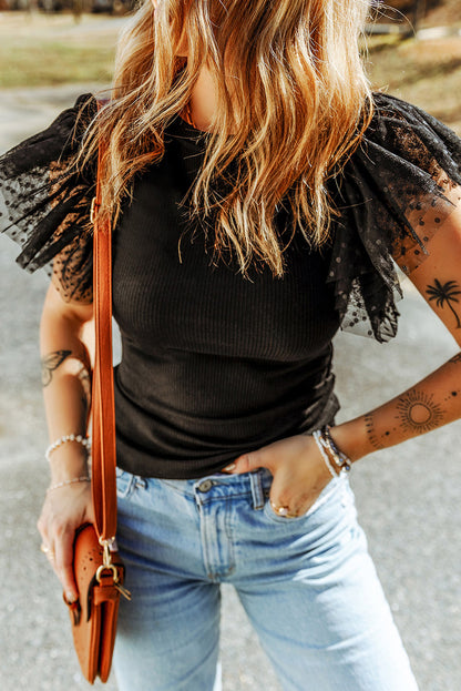 Haut en maille côtelée à volants et manches en maille à pois