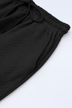 Conjunto de camiseta holgada con textura gris y pantalón con cordón