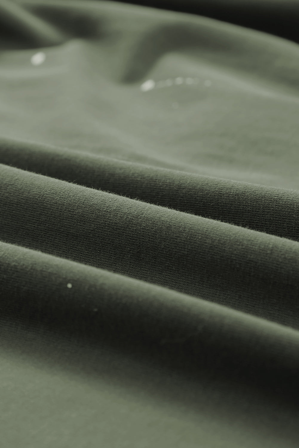 Haut à manches courtes et ourlet asymétrique délavé et vieilli