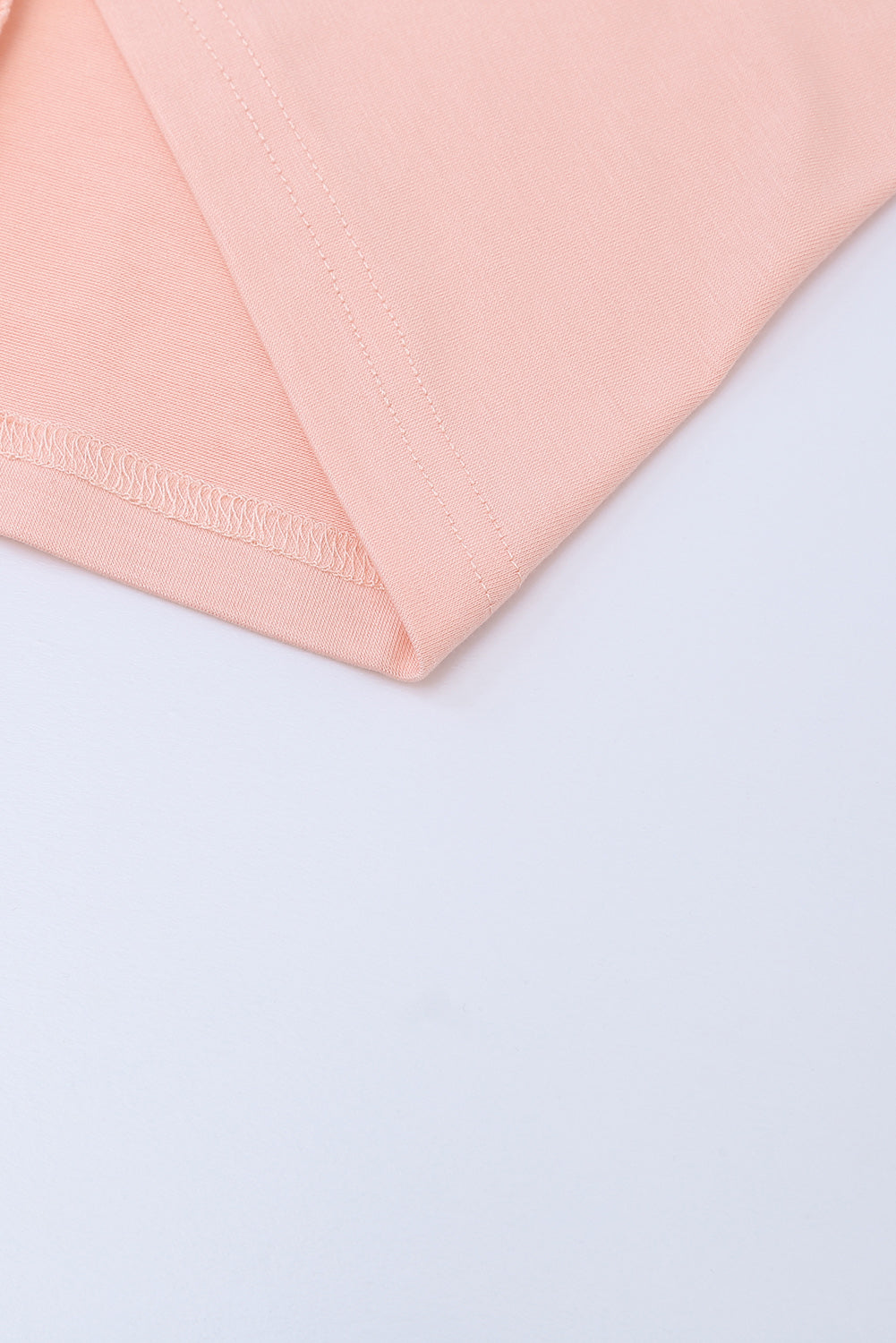 Tunique à manches courtes avec poches latérales 