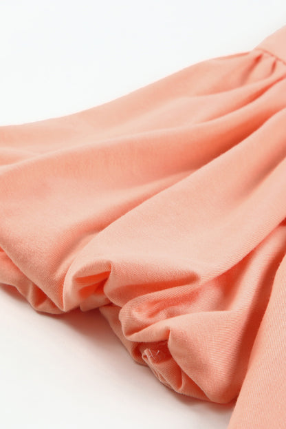 Chemisier à col rond et manches bouffantes 