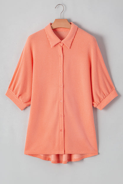 Chemise ample à manches mi-longues et ourlet haut-bas boutonné, couleur pamplemousse orange