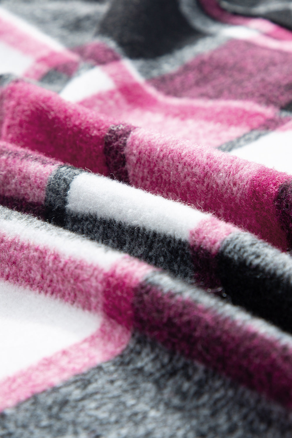 Veste ample à carreaux noirs et blocs de couleurs