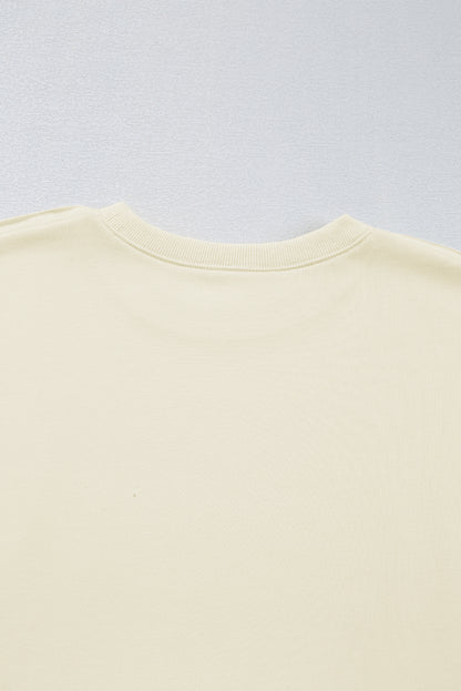 Robe courte plissée ample à motif patchwork floral vert