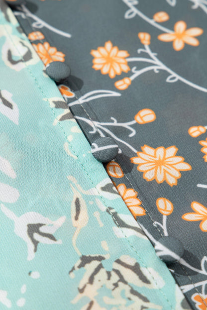 Chemisier vert à manches lanternes et col en V boutonné, motif patchwork floral, grande taille