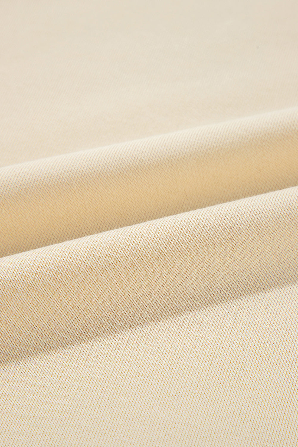 Sweat-shirt beige à manches boutonnées et épaules tombantes