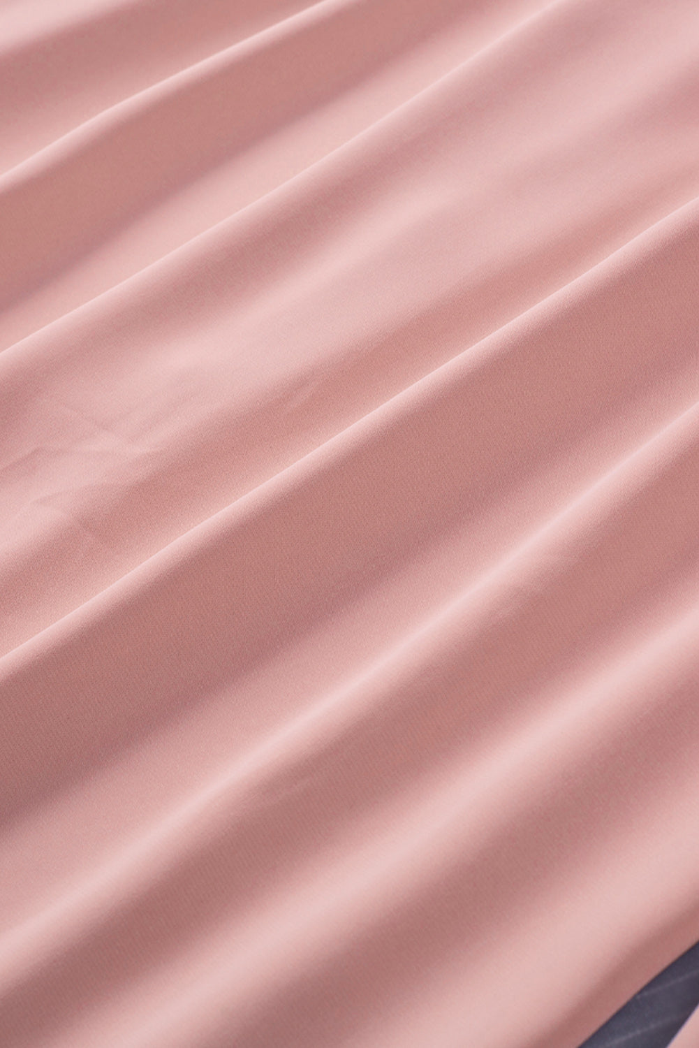 Chemisier boutonné à manches bouffantes de couleur unie