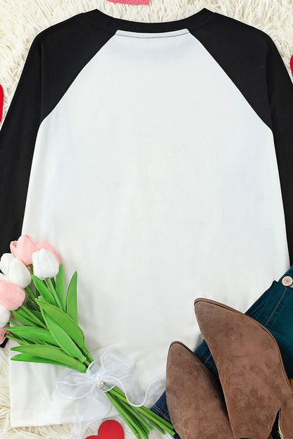 Haut raglan à motif flocons de neige et sapin de Noël