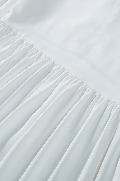 Chemisier à manches cloche et empiècements en crochet