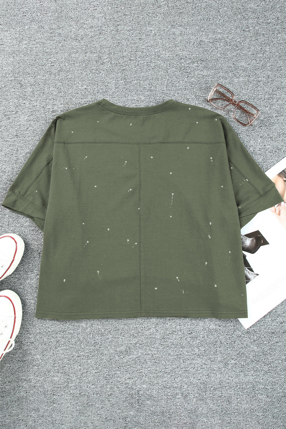 Haut à manches courtes et ourlet asymétrique délavé et vieilli