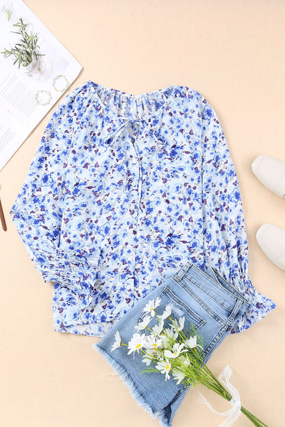 Blusa con botones y cuello en V con estampado floral 