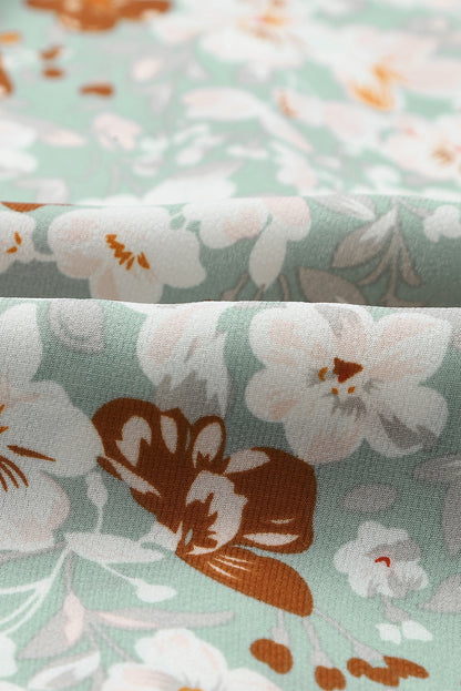 Blusa con botones y cuello en V con estampado floral 