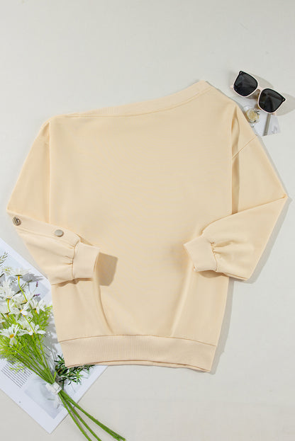 Sweat-shirt beige à manches boutonnées et épaules tombantes