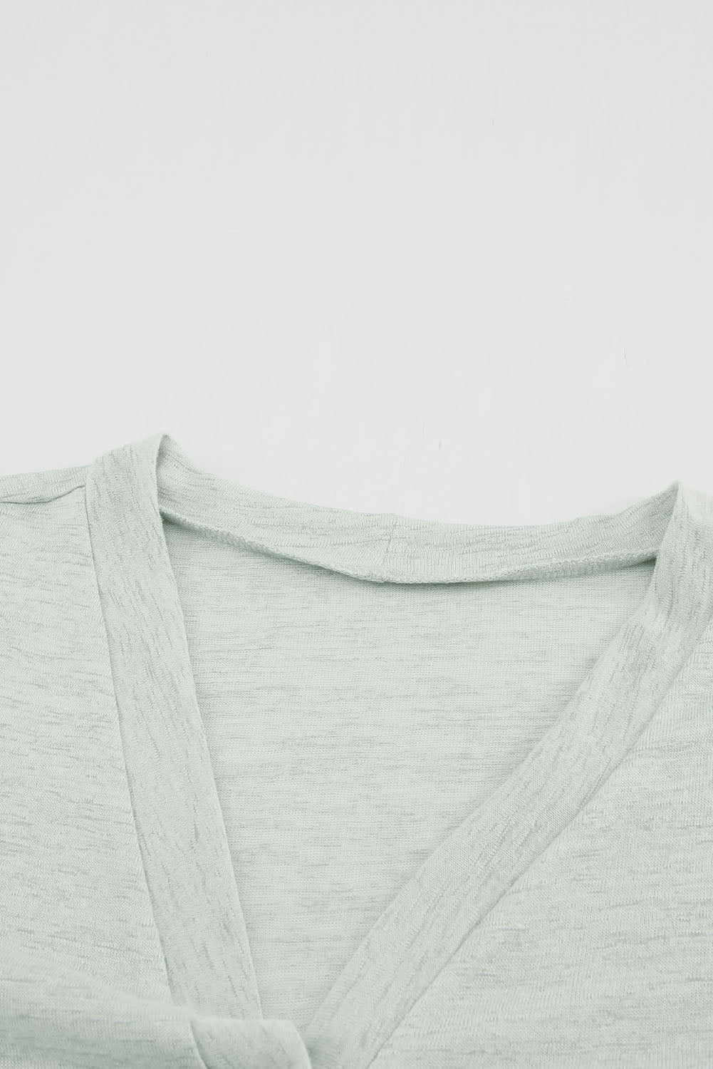 Cardigan ouvert à boutons de couleur unie beige