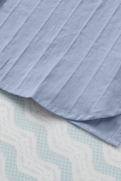 Camisa con botones texturizados y bolsillos