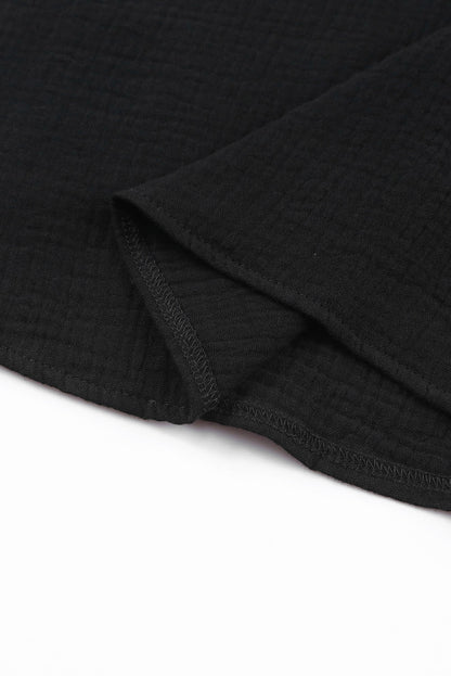 Chemisier texturé à manches flottantes et col à volants 