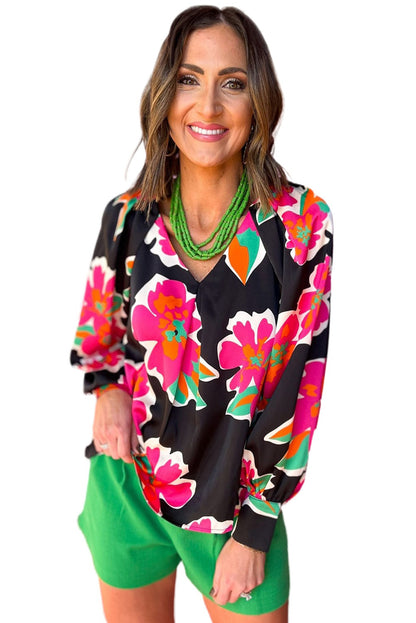 Chemisier à manches bouffantes et imprimé fleuri 