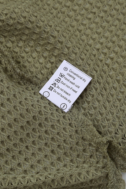 Haut ample en tricot gaufré à col fendu et poches