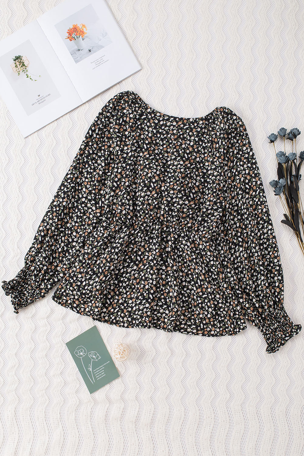 Blusa de manga larga con volantes y lazo delantero con estampado floral