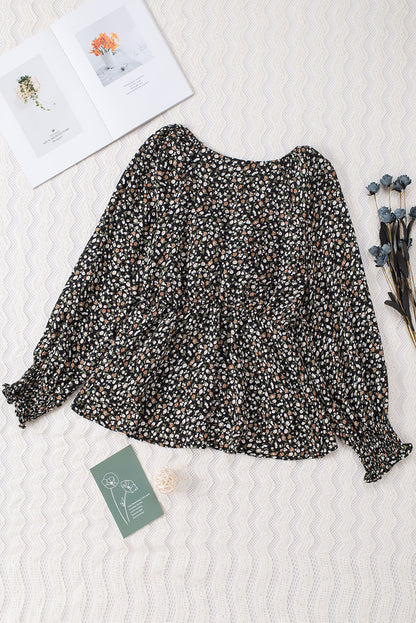 Blusa de manga larga con volantes y lazo delantero con estampado floral