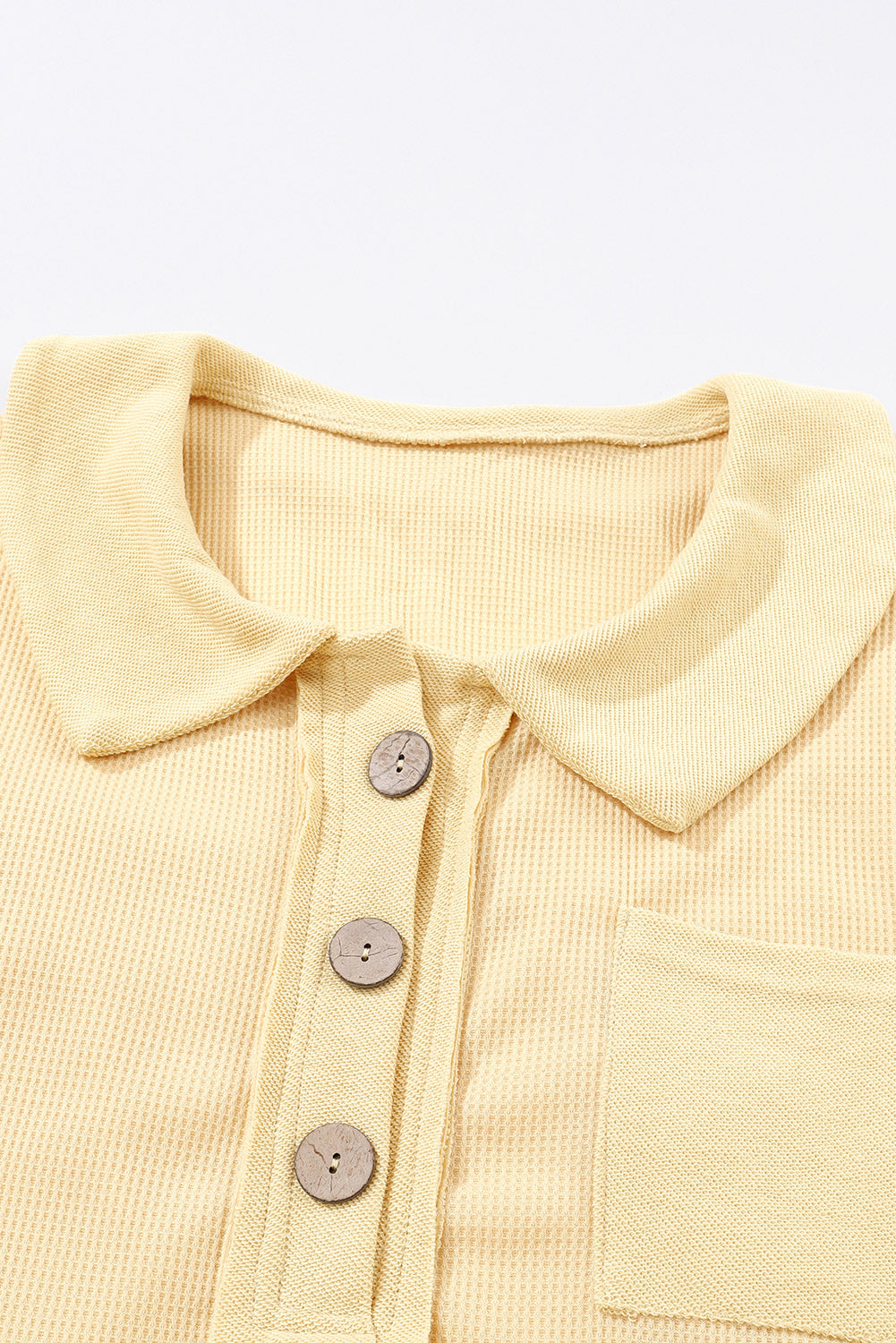 Top de manga larga con botones de punto tipo gofre marrón 