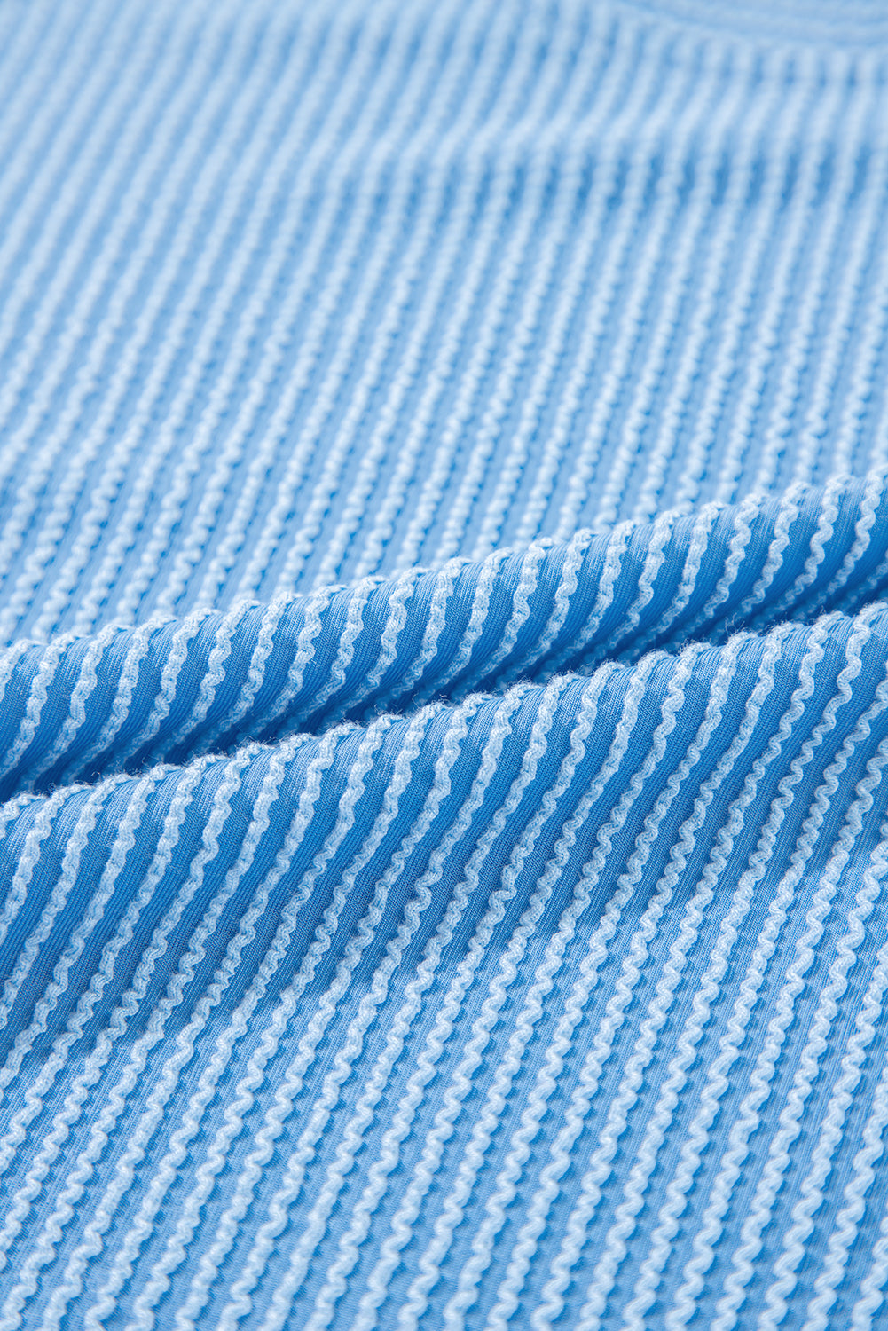 Ensemble t-shirt à manches courtes et pantalon large en tricot côtelé bleu uni