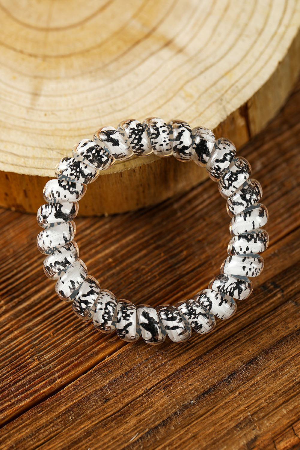 Coletero con cordón para teléfono floral negro